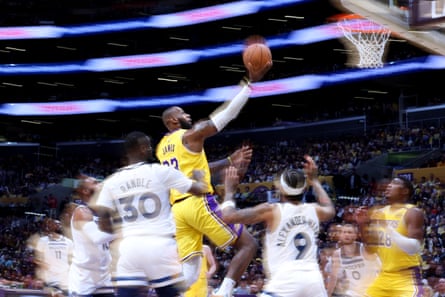 LeBron James of the Los Angeles Lakers takes a shot during a basketball match in 2024.