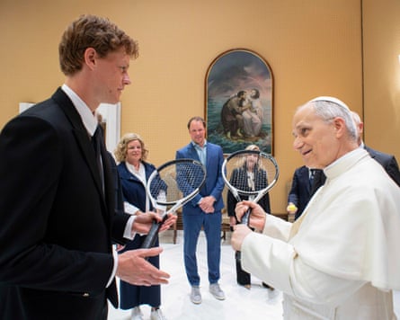 Pope Leo meeting Jannik Sinner in the Vatican. Both are holding tennis rackets