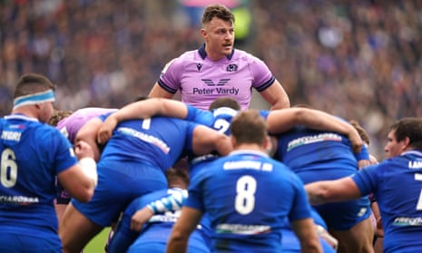 Scotland's Jack Dempsey oversees a scrum.