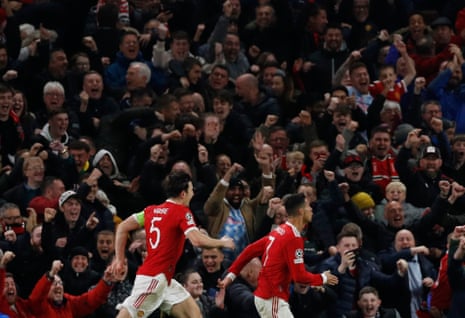 The Manchester United fans celebrate as do Cristiano Ronaldo and Harry Maguire.