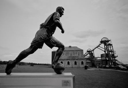 A statue by Tom Maley of Jackie Milburn at Woodhorn Colliery Museum, near Ashington in Northumberland