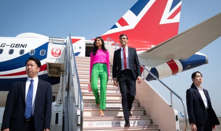 British prime minister Rishi Sunak and his wife, Akshata Murty, disembark in Tokyo on Thursday ahead of the G7 Summit.