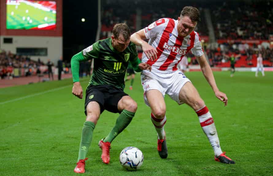 The 6ft 6in Harry Souttar battles with Jack Stacey during Stoke’s game at home to Bournemouth last October.