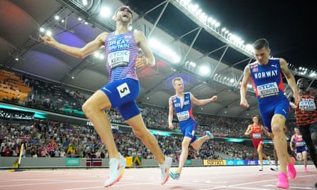 Josh Kerr crosses the line ahead of Jakob Ingebrigtsen (right) to win the gold in the 1500m final a the World Athletics Championships in Budapest last August.