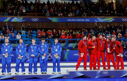 Men’s curlers at the medal ceremony.