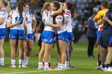 Isabel Rowe and Evie Cousins console each other as they exit the world cup after defeat to Samoa.