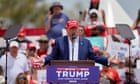 Trump refuses to shift on climate despite supporters needing aid at rallies in extreme US heat