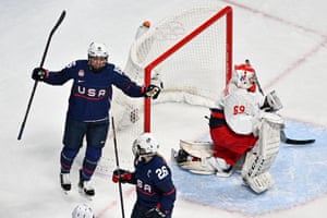 Savannah Harmon (L) celebrates after scoring a goal against players of Russia’s Olympic Committee.
