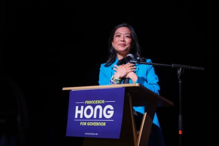 a woman in front of a microphone