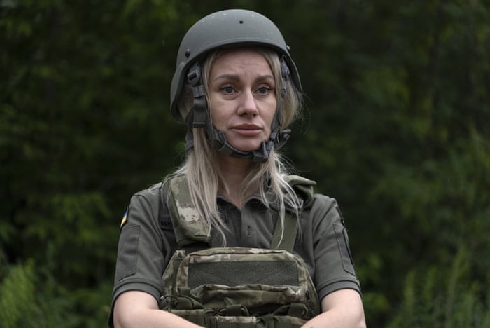 Servicewoman Liudmyla Rochacheva looks on as she attends a combat medic course training in Kyiv, Ukraine.