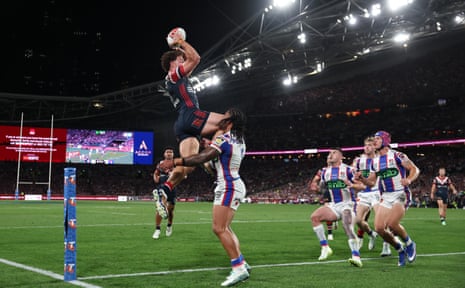 Mark Nawaqanitawase flies high and puts down what is thought to be a try