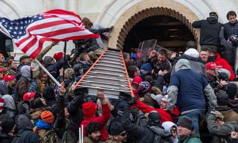 Pro-Trump rioters storm the Capitol on 6 January.