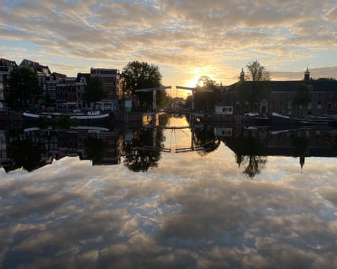 Amsterdam, the Netherlands ‘A view of the Amstel River. A positive thing about the flat Dutch landscape is that we always see a lot of sky and clouds. If the clouds are reflected by water, it becomes magic.’