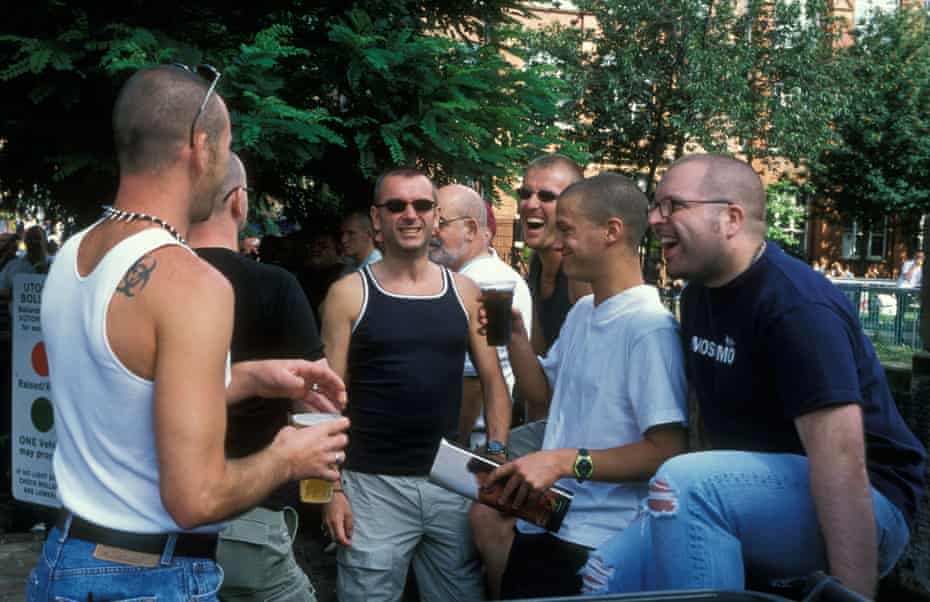 Men drinking at Gayfest in Canal Street, Manchester, 2001.
