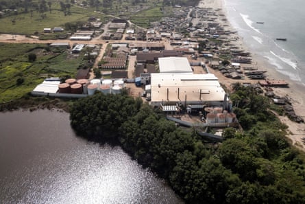 The Golden Lead Chinese fishmeal factory, standing between the beach and Bolong Fenyo salty lake, which is allegedly still polluted