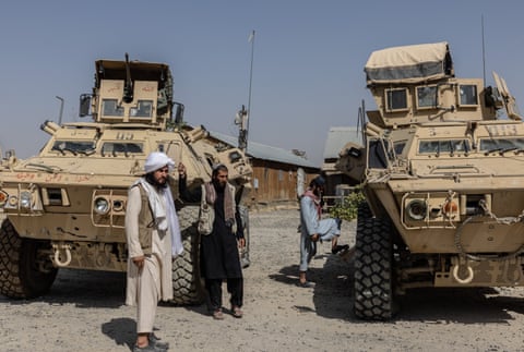 Taliban fighters at a military base in Ghazni city. The facility was previously run by the US but was handed over to Afghan forces two years ago.