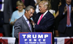 Donald Trump greets Nigel Farage during a campaign rally in Mississippi.