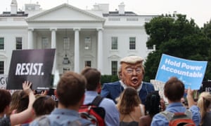 People protest against Donald Trump in front of the White House.