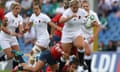 Vickii Cornborough of England breaks with the ball during a Women's Rugby World Cup match between England and Spain.