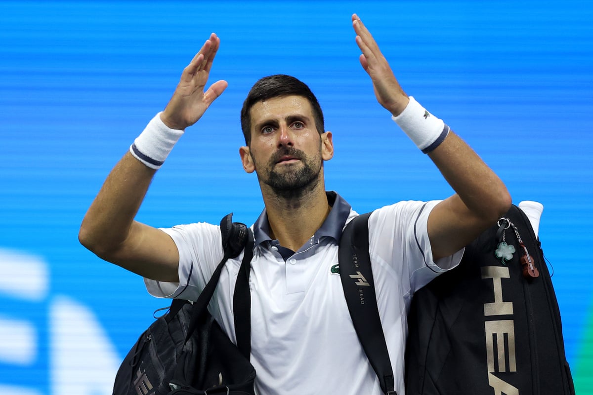 Novak Djokovic salutes the crowd