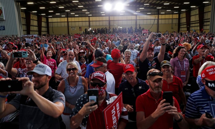 People attend a campaign rally by US President Donald Trump at Cecil Airport in Jacksonville, Florida, US, 24 September 2020.
