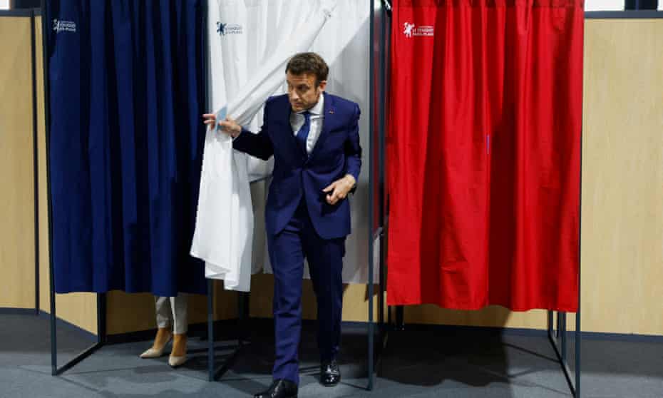 Emmanuel Macron votes in the second round of the French presidential elections