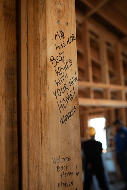 Notes written by volunteer builders inside a rebuilt home in Altadena.