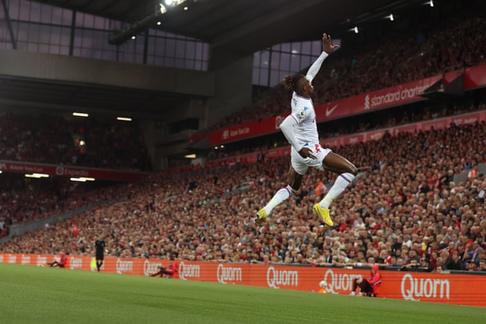 Liverpool v Crystal Palace: Premier League – live! | Premier League 4 Zaha leaps into the air in celebration.