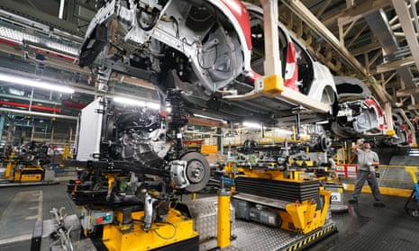 Workers on the production line at Nissan's factory in Sunderland