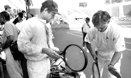 John McEnroe prepares to play Andre Agassi in the Arthur Ashe Aids Tennis Challenge, in 1992.