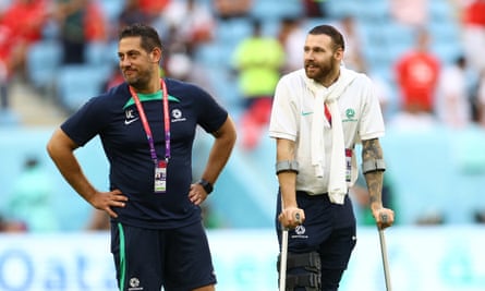 Martin Boyle (right) on crutches after Australia’s win over Tunisia.