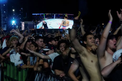 Fans watch the UFC fights from the Ellipse.