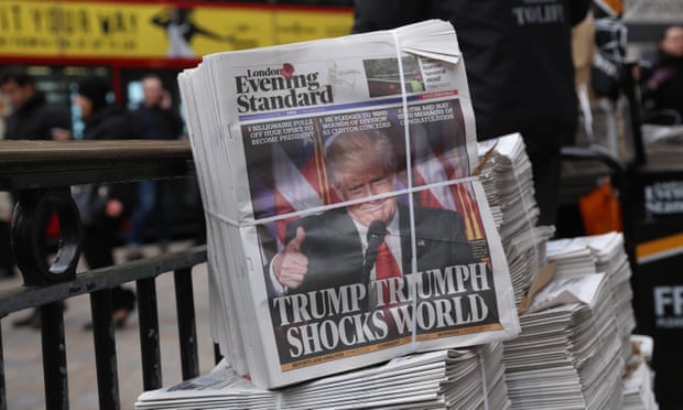 Donald Trump on the front page of the Evening Standard outside an underground station in central London.