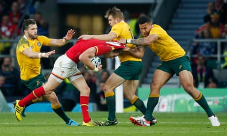 The Australian defence gets to grips with Wales’ Liam Williams.