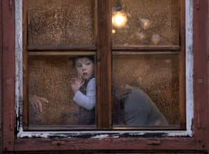 Sibiu, RomaniaOne year-old Heidi peers from a rain drop-covered window in the Transylvanian town. Sibiu will host the informal European Union Heads of State summit which will bring together EU heads of state or government, on May 9.