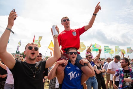 Three lions on the shirt, one lad on the shoulders.