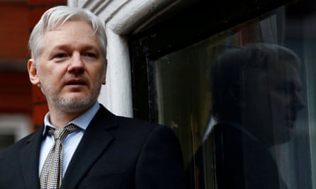 Julian Assange making a speech from the balcony of the embassy last year.