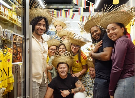 Members of the Latino community in straw hats