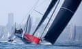 Andoo Comanche sails through Sydney Harbour during the start of the Sydney to Hobart yacht