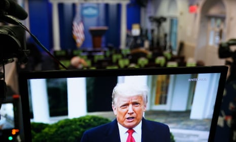 Donald Trump seen on a television screen on the afternoon of 6 January
