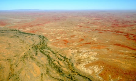 Aerial view of creeks cutting through parched outback in South Australia’s far north.