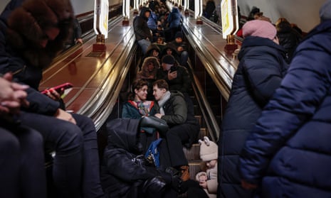 People shelter in the Kyiv metro as Russia launches a new wave of missile strikes across Ukraine.