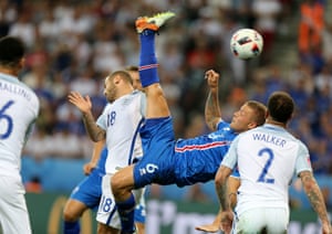 Ragnar Sigurdsson shoots with a bicycle kick which is blocked by Hart.