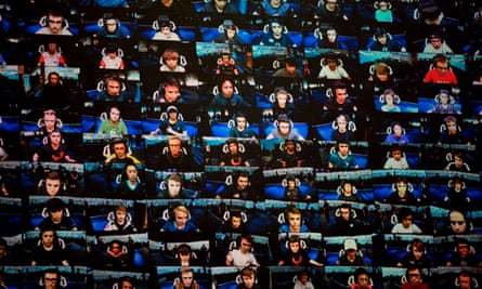 dozens of players on a grid of screens