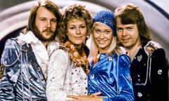 Abba pose for a photo on stage