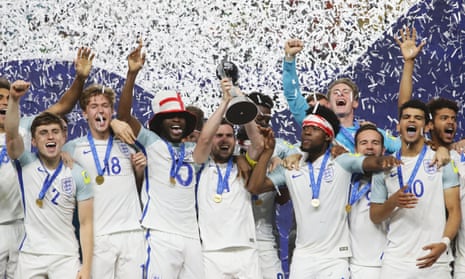 England’s players celebrate with the trophy after their Under-20 World Cup final victory over Venezuela.