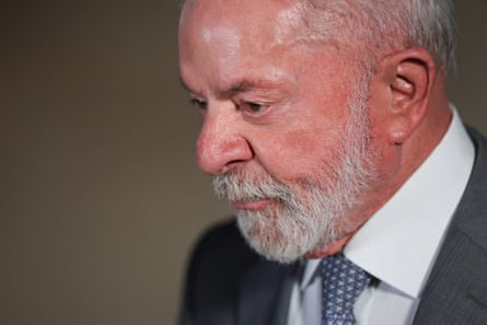side profile of man wearing suit and tie