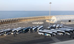 Buses parked at the Civitavecchia port ready to transport Australian Costa Victoria passengers to Rome