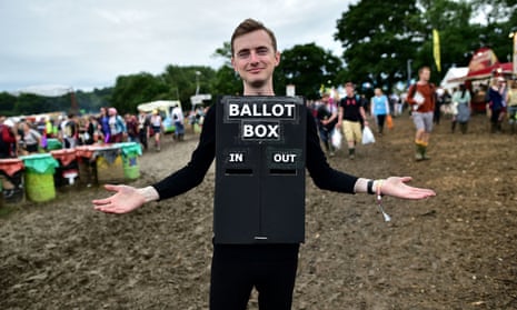 Patrick Irish, from Gloucestershire, dresses as a ballot box at Glastonbury.