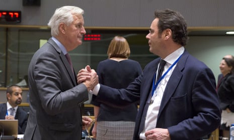 Michel Barnier, left, speaks with Spain’s secretary of state for the European Union, Jorge Toledo Albinana, during a meeting of EU ministers in Brussels.